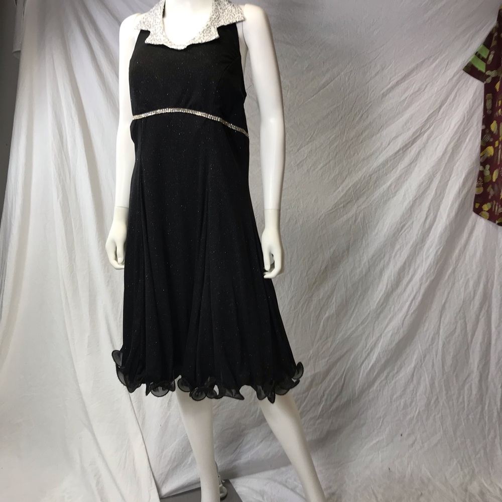 Dress is a size 15 to 16 brand is rivers